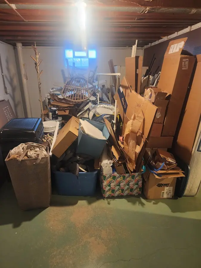 Roll-off dumpster container at job site for Yard Waste Dumpster Rental in Amite City